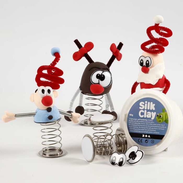 Julefigur av Silk Clay på fjær
